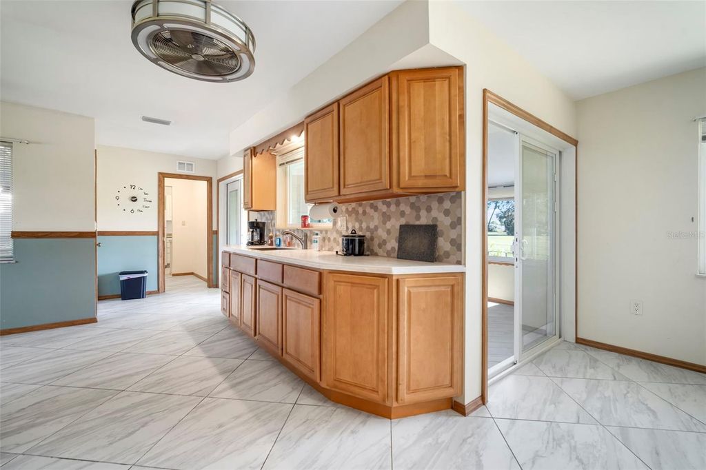 Photo of 609 Fox Hills Drive, Sun City Center, FL 33573 (MLS # TB8432588)