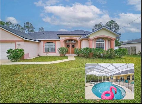 Photo of 18 Squirrel Place, Palm Coast, FL 32164 (MLS # FC314210)