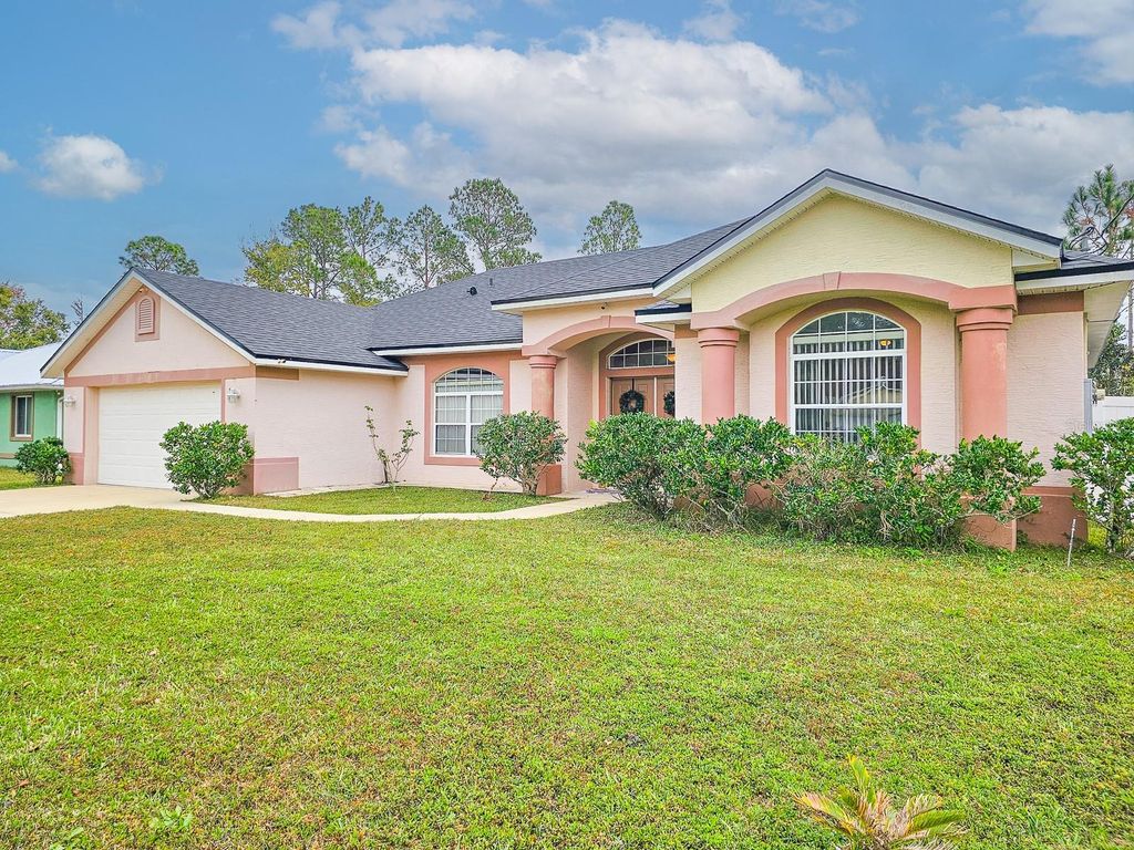 Photo of 18 Squirrel Place, Palm Coast, FL 32164 (MLS # FC314210)