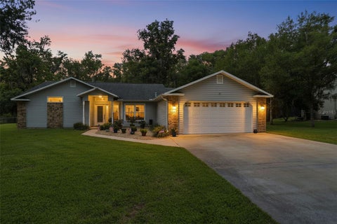 Photo of 602 Erin Way, Brooksville, FL 34601 (MLS # W7886621)