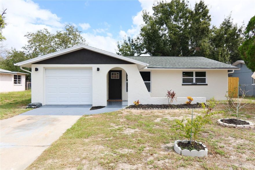 One or more photo(s) has been virtually staged. Welcome to this completely renovated 2-bedroom, 2-bathroom block home in Pasco County, offering modern comfort with no HOA, no CDD, and no flood insurance required. Located in a high-and-dry area within Flood Zone X, this property has never flooded, providing excellent long-term security and value.

Inside, the home features over 1,426 square feet of living space with brand-new luxury vinyl flooring throughout, fresh interior and exterior paint, and a stylish, modern design. The kitchen has been updated with quartz countertops and brand new stainless steel refrigerator, microwave, and dishwasher. A spacious layout includes a living room, dining area, and additional family room—ideal for relaxing or entertaining.

The home also includes a full-size 1-car garage with a new garage door, plus all major systems have been updated for peace of mind: a brand-new HVAC system, a 2021 roof, and a newer water heater. With a lot size of 5,400 square feet, this property provides just the right amount of space without overwhelming maintenance needs.

Located just off US-19, this home offers quick access to Tampa, Clearwater, parks, hospitals, and beaches—without the restrictions or costs of a homeowners association. It’s a move-in-ready property in a quiet, well-kept neighborhood, priced at $265,000 with low annual taxes and zero monthly fees.

If you're looking for a clean, modern home with major updates and zero hassle, this is the one. Schedule your private tour today.
