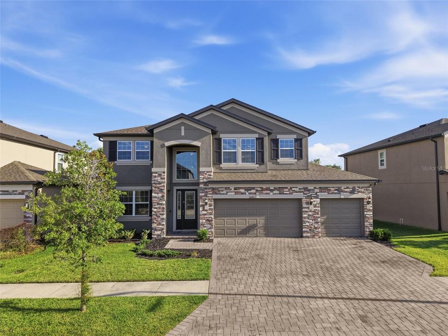 Welcome to luxury living in the highly sought-after Epperson Lagoon community! This stunning home was thoughtfully designed with exceptional attention to detail and upscale finishes throughout. From the moment you enter, you are greeted by soaring high ceilings, elegant chandeliers, tray ceilings, and breathtaking marble flooring that flows seamlessly throughout the entire home and stairways. Crown molding throughout adds an extra touch of sophistication and elegance.

The grand foyer opens into a spacious open-concept layout leading into the gourmet kitchen, creating the perfect space for entertaining and everyday living. The gourmet kitchen also features a butler’s pantry, offering additional prep space, storage, and convenience for hosting gatherings. Designer features include custom metal baluster stair railings, luxurious finishes, and expansive living spaces filled with natural light.The oversized primary suite offers a private balcony overlooking peaceful conservation views, creating the perfect retreat to relax and unwind. Upstairs, you’ll find a spacious loft area complete with pre-installed plumbing for a future dry bar, ideal for entertaining or creating the ultimate flex space.

In addition, the backyard offers ample space for a future pool installation if desired. This home was thoughtfully designed with convenient main-floor bedroom and bathroom access that would allow easy entry and exit to a future pool area, creating the perfect setup for entertaining and outdoor living.

Car enthusiasts will love the rare tandem garage with room for up to 5 vehicles, complete with a car lift that conveys with the home. This home also features an extended paved driveway, providing additional parking space and enhanced curb appeal.

Located within a gated community, residents enjoy added privacy and exclusivity while experiencing Epperson’s unmatched resort-style amenities, including access to the nation’s first crystal lagoon featuring sandy beaches, kayaking, paddle boarding, water slides, obstacle courses, swim-up bars, cabanas, live entertainment, restaurants, golf cart-friendly streets, and year-round community events. The community also includes ultra-high-speed internet and cable services, adding convenience and connectivity to your everyday lifestyle.

Conveniently located near shopping, dining, major highways, and top-rated schools, this one-of-a-kind luxury home truly offers the perfect combination of elegance, functionality, and lifestyle. If you have been searching for a luxury home that offers upgraded finishes, resort-style living, and exceptional attention to detail, this is the one for you!

Additionally, select furniture pieces may be available for purchase separately if interested.