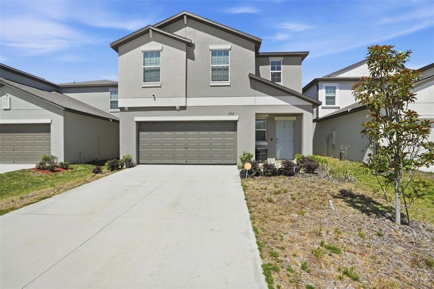 Welcome to this beautifully designed two-story home….Eligible for FHA, VA, and Conventional financing, this property also features an ASSUMABLE 4.125% mortgage, NO CDD fees, NO FLOOD ZONE (Flood Zone X), and a LOW HOA of just $199 quarterly.


Step inside to an inviting OPEN-CONCEPT floor plan where the kitchen, dining area, and living room flow seamlessly together, creating the ideal space for everyday living. The main living areas feature durable ceramic tile flooring, while expansive windows and sliding glass doors fill the home with an abundance of natural light and provide access to the backyard.


Upstairs, a spacious loft offers endless flexibility and can easily serve as a media room, game room, home office, playroom, or additional lounge space. All four bedrooms are thoughtfully located on the second floor, including the generously sized owner’s suite complete with a private ensuite bath designed for comfort and relaxation.


Located in the highly desirable Isle of Avalon master-planned community in Spring Hill, residents enjoy access to the Villages at Avalon clubhouse featuring gathering rooms and a resort-style swimming pool. Conveniently situated near shopping, dining, and entertainment, this prime location also places you just a short drive from outdoor Florida favorites including SunWest Park and the stunning Weeki Wachee Springs State Park