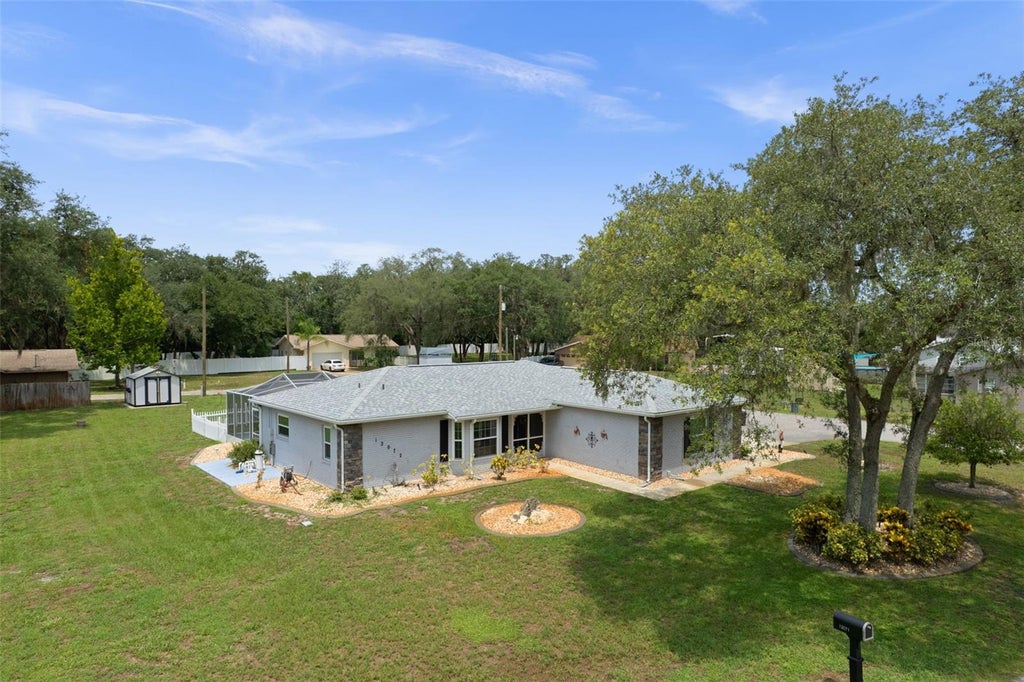 Photo of 12072 Lacey Drive, New Port Richey, FL 34654 (MLS # W7889519)