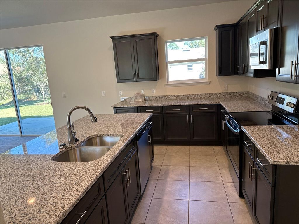 Photo of 1464 Shadow Lane, North Port, FL 34286 (MLS # OM718872)
