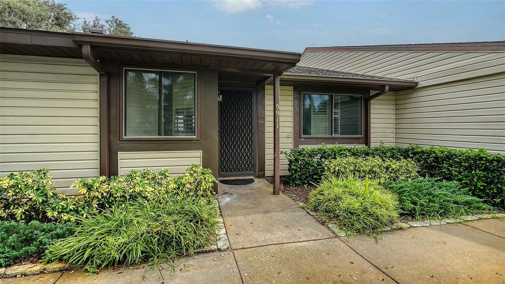Photo of 5911 39th Avenue W, Bradenton, FL 34209 (MLS # A4666931)