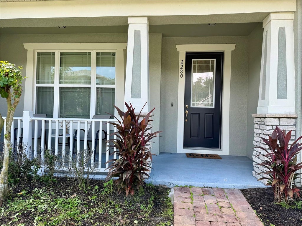 Photo of 2280 Centerra Loop, Kissimmee, FL 34741 (MLS # O6438234)