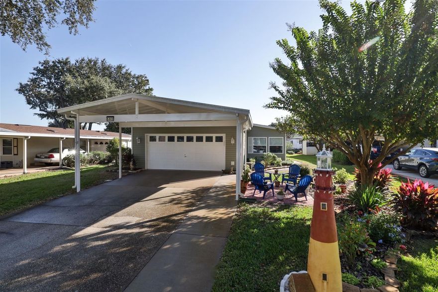Very spacious 1993 Palm Harbor home located in the active 55 + community of Edgewater Landing where you own your land and do NOT pay any lot rent.  This 3 bedroom, 2 bath home has an open floor plan.  The family room and kitchen/dining area are open.  Family room is separated from living room with French doors.  All windows and doors have been replaced, kitchen and bathrooms updated, gray piping replaced, Roof ten years old, HVAC and flooring recently replaced.  Large screened in porch great to sip your morning coffee in.  Home has indoor laundry, and large bedrooms with great closets.  New ceiling fans and lighting through out.  Two stall attached garage with screened overhead door as well as a two stall carport gives lots of parking.  Home is located on a quiet cul-de-sac in great neighborhood.  Edgewater Landing has a mile of frontage on the Intracoastal waterway, hosts a clubhouse which holds numerous clubs and activities,  tennis, pickleball, bocci ball, work out room, heated pool and hot tub, woodshop, deck with grill.  HOA dues include high speed internet and Platinum cable.
There is a fishing dock as well as a boat launch and community dock with table and benches to sit on and watch the space launches or see the dolphins frolic in the river.  Either RV or boat storage is available when there is an opening at no charge.  This is a great active community. ;Water: City