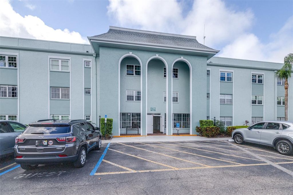 Photo of 1706 Belleair Forest Drive #336, Belleair, FL 33756 (MLS # TB8460859)