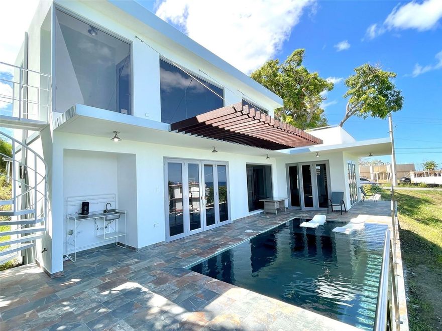 Welcome to your new home in Pueblo Ward, Rincon! This stunning custom home offers a perfect combination of luxury and comfort, designed to meet the most demanding needs. With 3 spacious bedrooms and 3 bathrooms, this residence provides ample space for family living and entertaining.

Enjoy unparalleled views of Desecheo Island and the ocean from the comfort of your home. The property features elegant details in every nook and cranny, including a spectacular swimming pool and a solar system that ensures energy efficiency and sustainability. In addition, you will find a separate one bedroom, one bathroom apartment with terrace, ideal for guests or as a potential source of income.

The location is simply unbeatable, just minutes away from beautiful beaches, exquisite restaurants, supermarkets and the vibrant city center. This home is not only an excellent choice as a primary residence, but also as a profitable real estate investment.

Don't miss the opportunity to acquire this gem for a price of $1,250,000. Make this place your new home or an excellent income property!