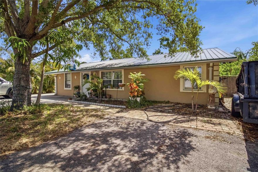 This 3 bedroom, 2 bathroom home offers a split floor plan and an open living room and kitchen area that feels spacious and functional. The home has been maintained over the years and includes a permitted outdoor porch added in 2021, perfect for enjoying the large backyard and outdoor space.The metal roof was installed in 2018, giving buyers peace of mind on one of the major updates already completed. The yard offers plenty of room for pets, gatherings, parking, or future projects.Priced at $300,000, this is a solid option for buyers looking for space and value. Sellers are motivated.