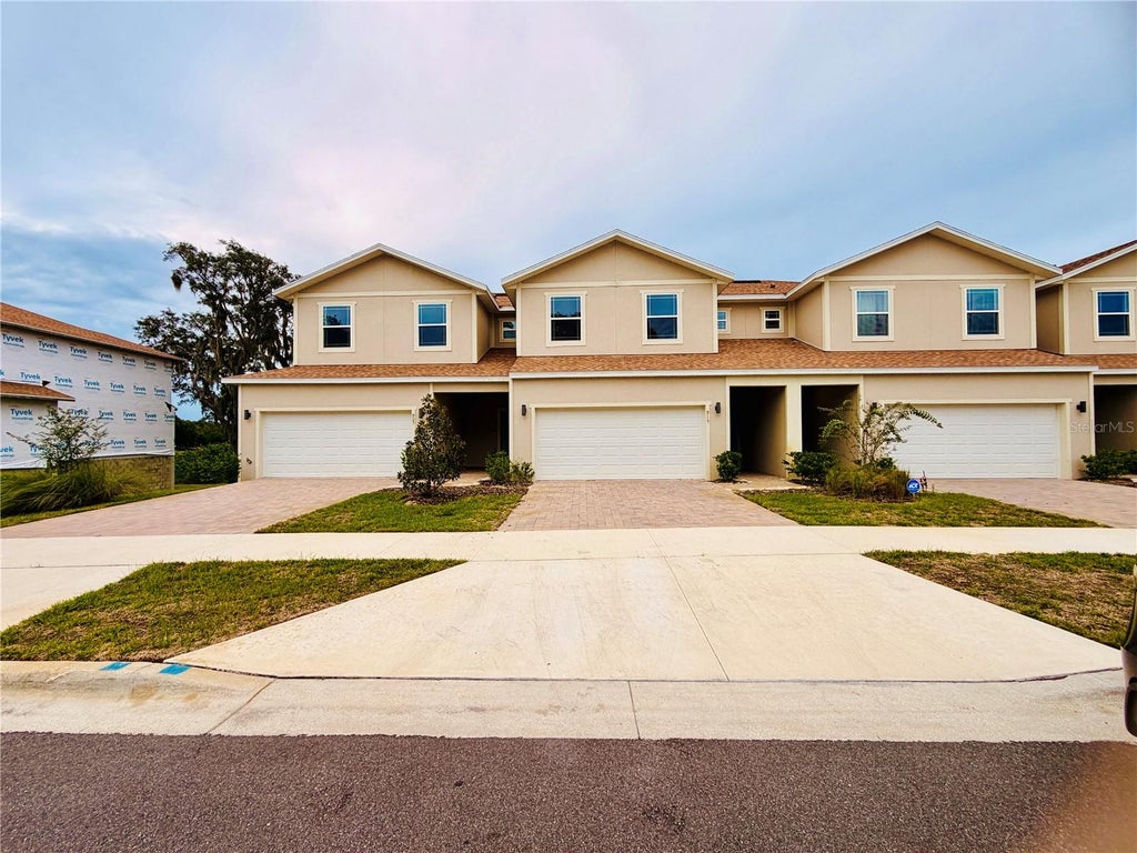 Photo of 915 Lakefront Village Drive, Clermont, FL 34711 (MLS # O6447039)