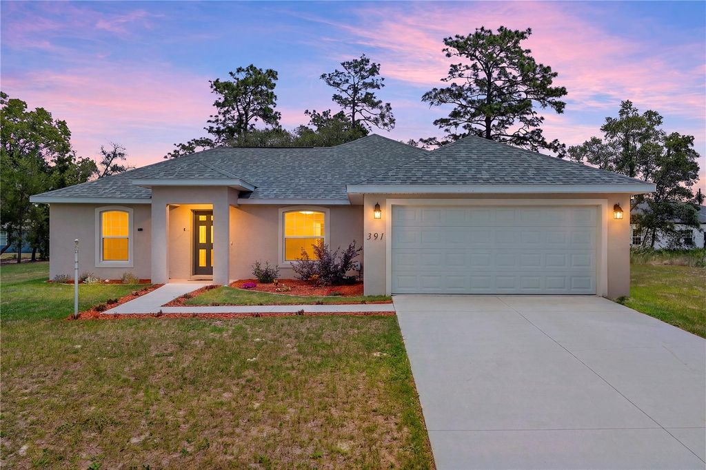 Photo of 391 Marion Oaks Pass, Ocala, FL 34473 (MLS # OM724591)