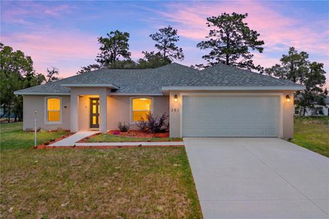 Photo of 391 Marion Oaks Pass, Ocala, FL 34473 (MLS # OM724591)