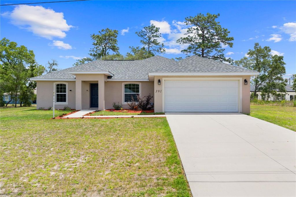 Photo of 391 Marion Oaks Pass, Ocala, FL 34473 (MLS # OM724591)