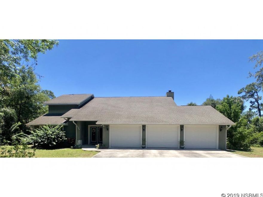 Overlooking Turnbull Bay sitting on over a half acre is this two story custom built 3 BR/2.5 home with bonus room lovingly maintained by the original owners and awaiting its new owners. Downstairs you will find a large living room overlooking the Bay with screened-in back porch, large kitchen for entertaining family and friends, formal dining room, game/billiards/family room, and half bath.  Upstairs you will find 3 bedrooms, a bonus room which can be used as an office or extra bedroom, and 2 full baths. 3 car oversized garage to house all of your toys. This home also includes a 2.8 acre parcel of marshland on the Bay with endless possibilities and no HOA. Adjacent to Rocco Park which offers picnic facilities, tennis/basketball courts, a playground & fishing pier. ;Water: City