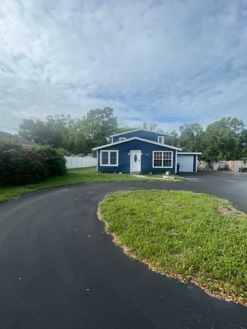 A must see!!! Take a look at a new rental opportunity in centrally located and desirable Largo. This 2,548 sq ft home on a large lot has 4 bedrooms, 2 1/2 bathrooms, and a one-car attached garage. An open floorplan on the entry floor with the living room/dining room/kitchen. There is a family room as well as a bedroom and bathroom. Also laundry room and office. Up the stairs is the master bedroom with a balcony and renovated bathroom and an additional bedroom. Located only 10 minutes from the award-winning Gulf beaches, excellent dining and shopping, plus easy access to downtown Tampa or St. Petersburg. Top rated schools are also close by. Reach out today for details on how to make this your next home! Available September 15th