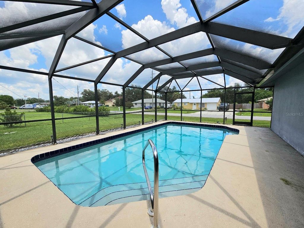 Photo of 21522 Beaverton Avenue, Port Charlotte, FL 33952 (MLS # C7512910)