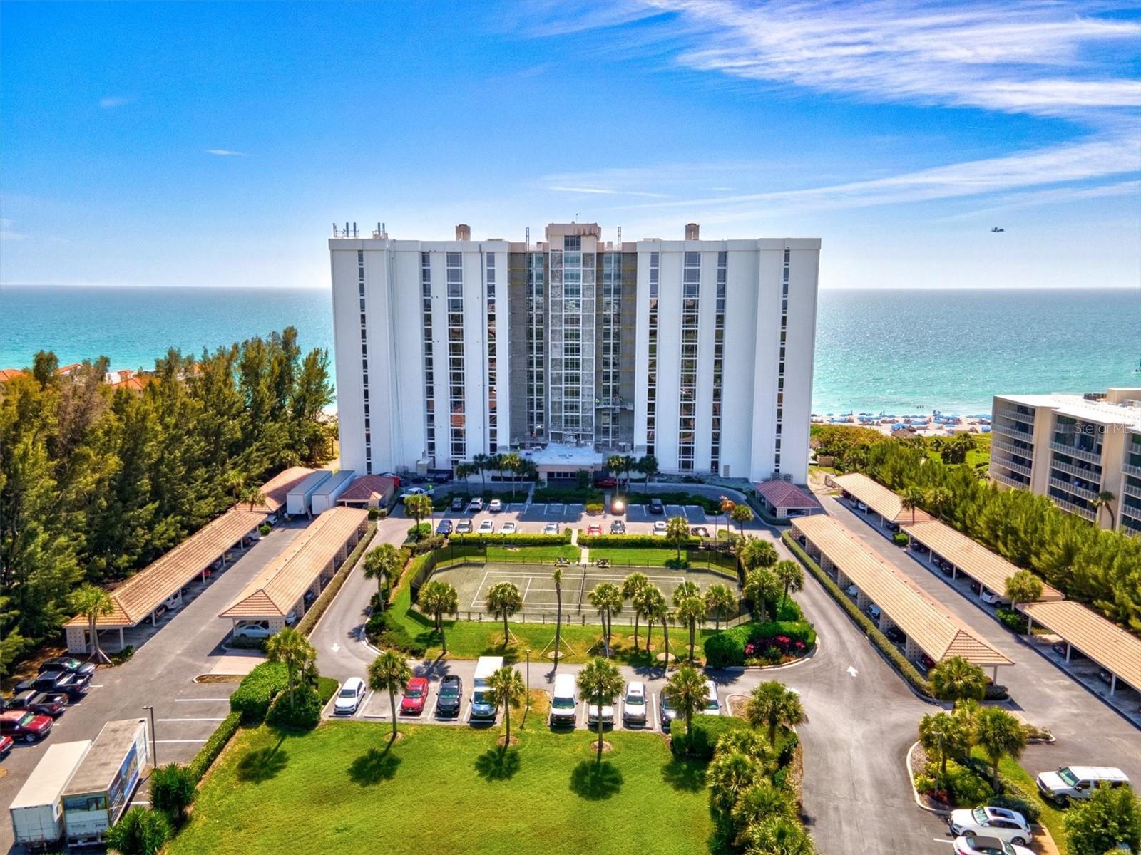 Gulf-Front Elegance | Sea Gate Club #10F | Longboat Key —Welcome to Sea Gate Club #10F, a rarely available 10th-floor end unit offering spectacular, front-row Gulf views in one of Longboat Key’s most intimate beachfront communities. Perfectly positioned mid-island along the sandy shores of the Gulf of Mexico, this elegant 2-bedroom, 2-bath residence captures direct, unobstructed views of the turquoise waters and mesmerizing sunsets from nearly every room. As a corner unit, it’s bathed in natural light and offers enhanced sight lines—creating a bright, open, and serene coastal retreat. Step onto your private balcony and take in over 350 feet of secluded beachfront, where dolphins, manatees, and colorful marine life glide through the waves just beyond your door. Inside, you’ll find a blend of comfort and coastal sophistication, ideal for relaxing or entertaining. Sea Gate Club is a boutique community of just 89 residences spread across 15 stories, offering a uniquely quiet and refined lifestyle. The building has undergone major capital improvements in recent years, including impact-rated windows (2021), a full exterior restucco and repaint (2022), a new roof (2023), and upgrades to the pool, spa, and elevator doors. Additional enhancements are already in motion, with a new AC tower coming in 2025 and a sun deck scheduled for completion in Summer 2025—all fully paid for by current owners, totaling over $100K/unit. Residents enjoy resort-style amenities including a Gulf-front pool and hot tub, fitness center, clay tennis court, library, and a social room with catering kitchen. Shaded tiki huts, outdoor showers, and climate-controlled storage for bikes, kayaks, and paddleboards complete the experience of true beachfront living. Ideally located, Sea Gate places you just steps from Publix, CVS, and Bayfront Park, where you’ll find pickleball, tennis, shuffleboard, a playground, and kayak launch. Boaters will appreciate proximity to Longboat Key Moorings and nearby marinas, while St. Armands Circle—just three miles away—offers an upscale mix of dining, boutique shopping, and laid-back coastal charm. Here, you truly get the best of both worlds: to the north, the natural beauty of Anna Maria Island, and to the south, the vibrant arts, culture, and dining of downtown Sarasota. Whether you’re soaking in sunset views from your balcony or exploring nearby island attractions, every day feels like a vacation. This is Gulf-front living at its finest—private, peaceful, and rarely available. Schedule your private showing today and claim your slice of Longboat Key paradise.