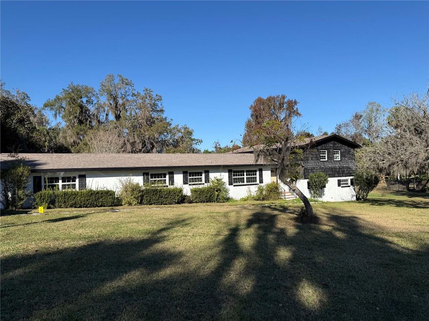 SELLER GIVING $10K IN CLOSING COSTS/PREPAIDS WITH FULL PRICE. Located in a highly sought after area is this massive 3,3736 sq ft POOL home sitting on .95AC. With 6 bedrooms and 4.5 bathrooms you won’t be fighting anyone over rooms or who gets a shower first! Speaking of guests and family, the kitchen is as open concept as it gets with ample space where you won’t be bumping into anyone and spilling the spaghetti sauce. Home comes equipped with 2 ACs (unsure of year), a detached 2 car garage for multi use purposes, a 2016 roof and a 2025 electric panel. This property has awesome potential for investment or primary residence, all it needs is some love.