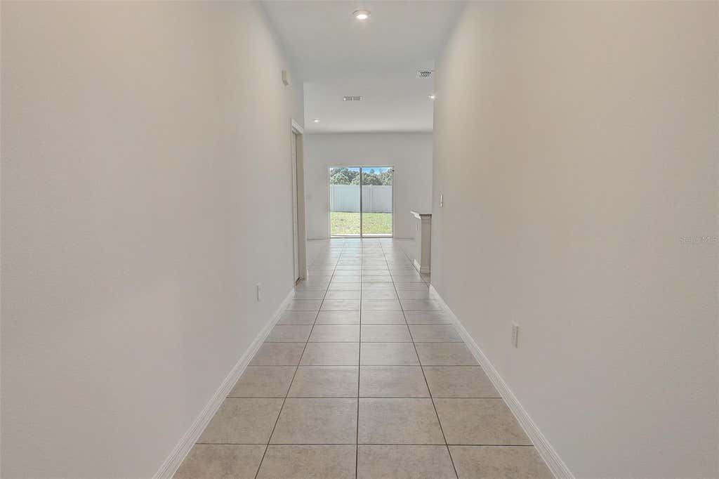 Photo of 851 Pepple Crest Lane, Eagle Lake, FL 33839 (MLS # O6415195)