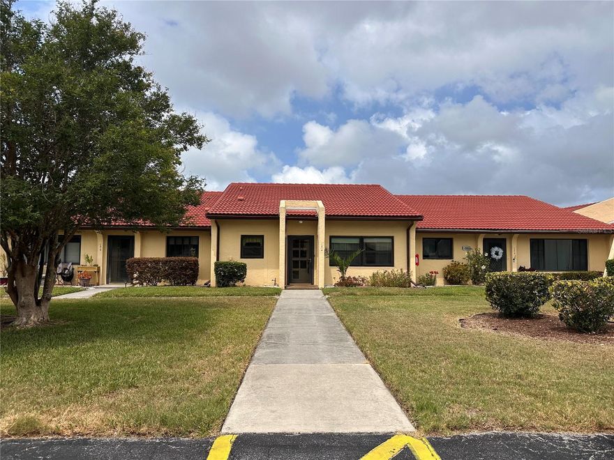 Fresh INTERIOR PAINT, new luxury waterproof flooring in bedroom along with some new updated lighting fixtures! Great opportunity in popular Meadowcroft, a 55+ community! This 2-bedroom, 2-bath villa offers a smart layout with both bedrooms featuring en-suite baths—perfect for privacy and convenience. While it could use some updating, it’s priced to sell and packed with value. You'll appreciate the impact-rated windows in the bedrooms and a fully enclosed patio with a storage closet for added space. The home includes an assigned carport and is being sold with a home warranty for peace of mind. Residents enjoy beautifully maintained grounds, newer tile roofs, a clubhouse, a heated pool, tennis, shuffleboard, and a scenic lake. Fantastic location close to medical facilities, shopping, and the beaches. Don’t miss this one! Some photos are virtually staged. Motivated Seller.