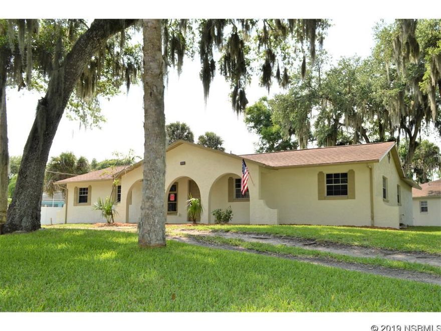 Hard to find 4/2/1 blk home completely remodeled in Florida Shores. Beautiful Oak Trees surround the large corner property. A spacious home, it has a NEW kitchen, NEW Stainless Steel appliances, NEW Flooring, updated bathrooms w/ new tile work, NEW light fixtures and ceiling fans, NEW interior and exterior paint, NEW HVAC  and more. Split plan perfect for larger families. HUGE Mastr bedroom overlooking patio. Fourth bedroom would make perfect kids room or office space. Large screened back porch area for relaxing and BBQs. Privacy fenced on the W boundary. Survey available. Kids can walk to school from this location. The garage is perfect for storage or could house a smaller vehicle. Close to shopping and eateries. Come see...includes a $5000 closing costs credit. ;Water: City