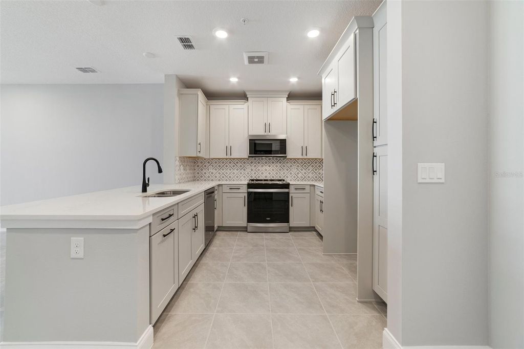 Photo of 7557 Laureate Boulevard #6401, Orlando, FL 32827 (MLS # O6383767)