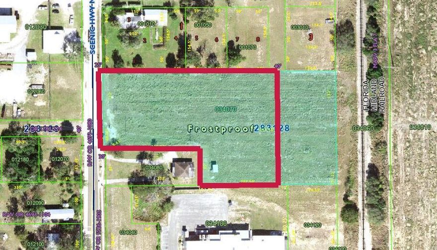 Industrial, 2.04 acres, Vacant Land within the city limits of Frostproof.  Zoned Commercial with Industrial Use this land is suited for Storage/mini warehouse, nursery, storage of sand/gravel/blocks, and many more options. Excellent access to major roadway and essential utilities.  Unmatched conveniences for both business and customer accessibility.  This location within the city limits ensures potential for future growth.  This is a sizable plot of versatile land ideal for long term investment or immediate development.  Owner financing may be a possibility