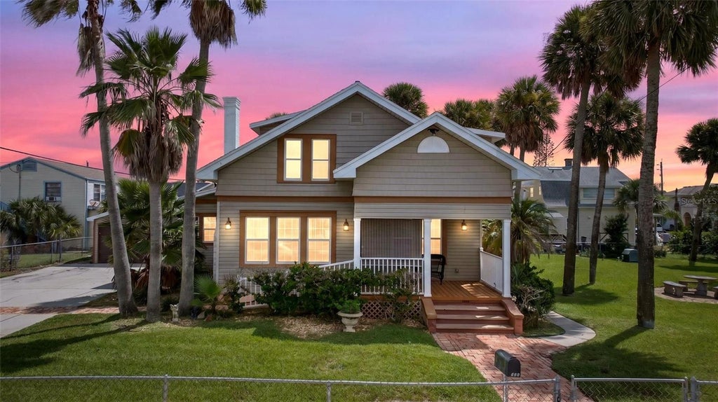 Photo of 409 S Grandview Avenue, Daytona Beach, FL 32118 (MLS # W7888960)