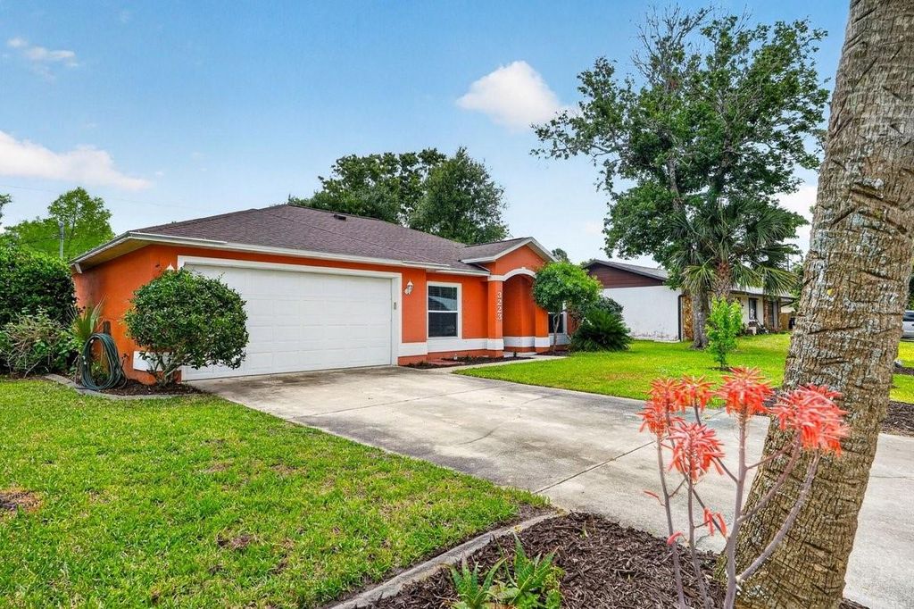 Photo of 3223 Travelers Palm Drive, Edgewater, FL 32141 (MLS # V4948798)