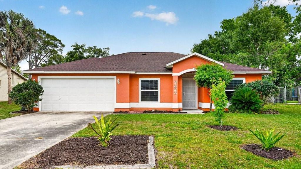 Photo of 3223 Travelers Palm Drive, Edgewater, FL 32141 (MLS # V4948798)