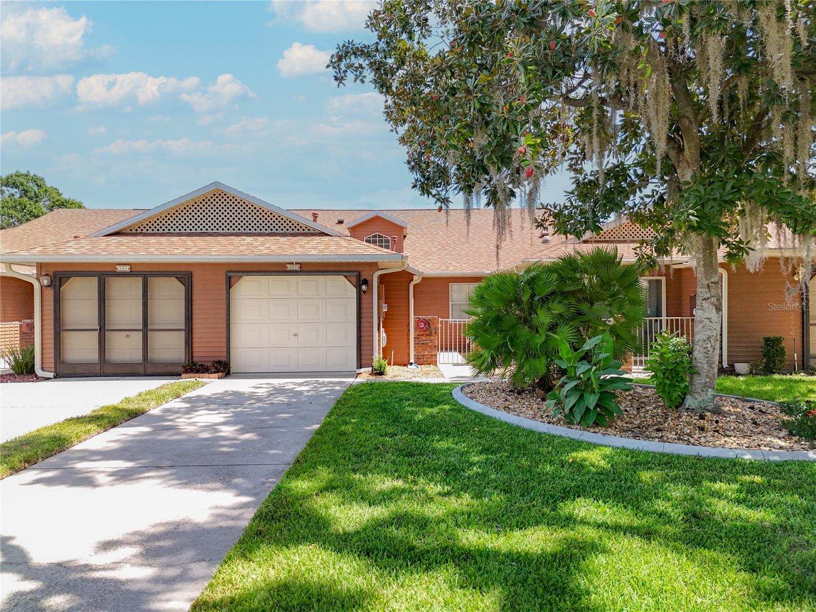 Charming Villa located in the highly sought-after Highland Lakes gated community of Leesburg, Florida, this well-maintained 2-bedroom, 2-bath villa offers comfort, convenience, and peace of mind with numerous recent updates.
The home features an enclosed Florida room, providing additional living space and versatility. Appliance upgrades have been thoughtfully completed, including Roof (2020), Water Heater (2021), Upgraded Electric Panel (2022), Solar Tube (2024), New Dishwasher (2024), New Garbage Disposal (2024), New Garage Door Opener (2025), Expansion Valve on Furnace (2025), New Stove (2025), Furnace (2017), Florida Room door and window replacements (2022), Replacement of a Split System A/C Unit (2010), recently refreshed cabinets & counter tops. This villa is being offered with optional furniture, including a king size Purple mattress that elevates, allowing buyers the flexibility to create a turnkey move-in experience.
Highland Lakes is a premier 55+ active community featuring outstanding amenities such as indoor and outdoor pools, a clubhouse with fitness and activity rooms, pickleball and tennis courts, walking trails, and RV/boat storage. Conveniently located near shopping, dining, medical facilities, and major highways, it offers both a vibrant lifestyle and everyday convenience.
All information deemed reliable but not guaranteed and has been provided by third-party sources. Buyer and/or buyer’s agent are advised to verify all facts that are material to their decision to purchase.