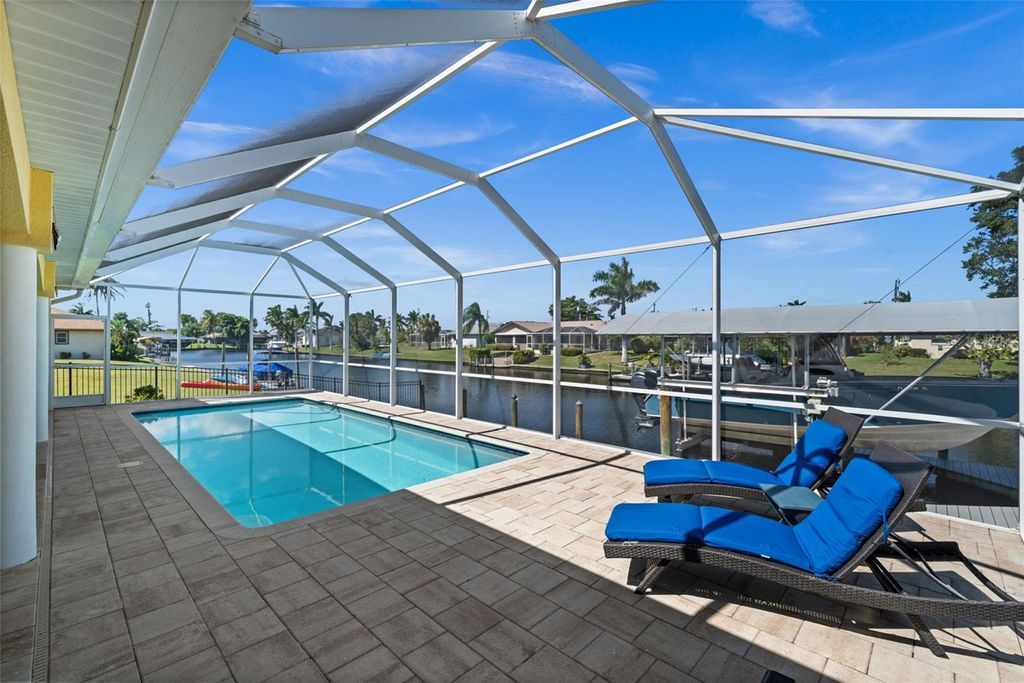 Photo of 211 SE 37th Lane, Cape Coral, FL 33904 (MLS # C7516558)