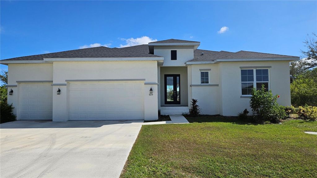 Photo of 9279 Rosebud Circle, Port Charlotte, FL 33981 (MLS # L4956057)