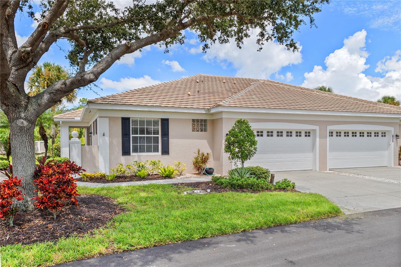 Welcome to your dream Villa in the highly sought-after St. Andrews East at The Plantation Golf & Country Club in beautiful Venice, Florida! This meticulously maintained 3-bedroom, 2-bath paired villa offers additional flex room/ den office with over 1500sqt of light-filled living space and a maintenance-free lifestyle in one of Venice’s most desirable communities.
Step into a spacious kitchen with ample cabinetry and direct access to a screened-in lanai overlooking lush landscaping and a serene pond—perfect for morning coffee or evening relaxation. The open-concept living and dining areas feature sliding doors that also lead to the lanai, blending indoor and outdoor living seamlessly.
This villa is ideally situated between two community pools, offering quick and easy access for leisure and socializing. The HOA covers exterior maintenance, including roof care, exterior painting, lawn care, and all landscaping—so you can enjoy the beauty of your surroundings without the upkeep.
For golf enthusiasts, optional membership to the Plantation Golf & Country Club gives you access to two championship 18-hole golf courses, tennis courts, pickleball, bocce, a fitness center, an Olympic-size pool, and a variety of dining options and social events.
Just minutes from Venice’s stunning beaches, historic downtown, boutique shops, fine dining, and Wellen Park, this villa offers the perfect blend of tranquility, luxury, and convenience.
Don’t miss your chance to own a piece of paradise—schedule your private showing today!