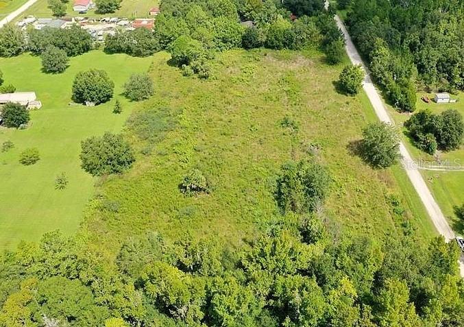 One or more photo(s) has been virtually staged. Build your dream home or getaway on this 1.14-acre high and dry lot in Daytona North, Bunnell. Located in a peaceful, rural setting with plenty of open space, this property offers flexibility for mobile, modular, or site-built homes (1,000+ sq ft). Zoned for agricultural use—bring your animals, start a garden, or enjoy country living your way. No HOA and low property taxes make this an ideal investment or homesite. Power nearby, easy access, and room to grow. Enjoy quiet surroundings just a short drive from Palm Coast, Flagler Beach, and local recreation. A great opportunity in Flagler County!