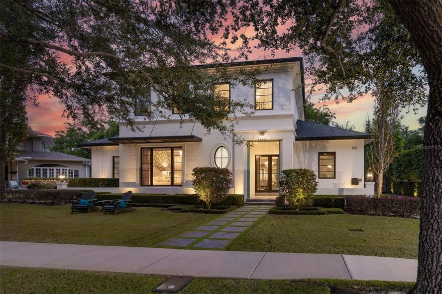 Built in 2017 by custom builder Keith Groninger, this five-bedroom, four and one-half bath residence blends Hollywood Regency design with modern innovation. Located on an oversized lot within a block of Lake Highland Preparatory School, the home offers a flexible layout that includes a detached guest suite above the two-car garage with steam shower, sauna and private entrance, ideal for use as a guest suite, gym, creative space or rental income opportunity.
The first floor features both the elegant primary suite and a junior guest suite. The primary includes a custom closet, dressing area, soaking tub, large shower, towel warmer and Toto bidet. Upstairs are two spacious bedrooms, a full bath and a large flex or playroom.
The chef’s kitchen is outfitted with Thermador tower refrigeration, 36-inch gas cooktop, Bosch and Fisher and Paykel dishwashers, custom cabinetry and lit glass buffet. A full wall of stacking doors connects the living area to a private outdoor retreat with a saltwater heated pool, Lynx outdoor kitchen, fire pit and dual lounge areas with retractable screens and split A/C.
Green-certified features include low-E windows, spray foam insulation and level 5 drywall. The Control4 system manages whole-home audio, video, security and lighting via touchscreen or mobile app. Additional features include three HVAC zones, tankless water heaters, Generac generator and remote-controlled gated driveway.
Discover the lifestyle this exceptional residence offers. Schedule your private tour today.