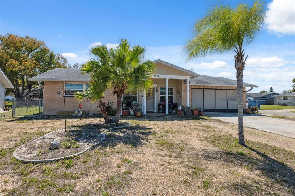 Photo of 7514 Bergamot Drive, Port Richey, FL 34668 (MLS # W7880922)