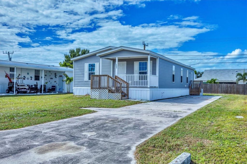 Photo of 1386 Ibis Drive, Englewood, FL 34224 (MLS # D6144502)