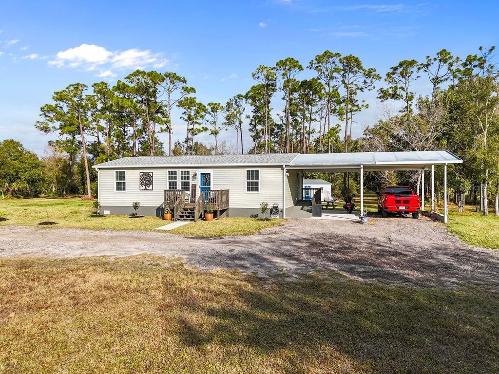 Photo of 6885 Rich Road, North Fort Myers, FL 33917 (MLS # C7521215)