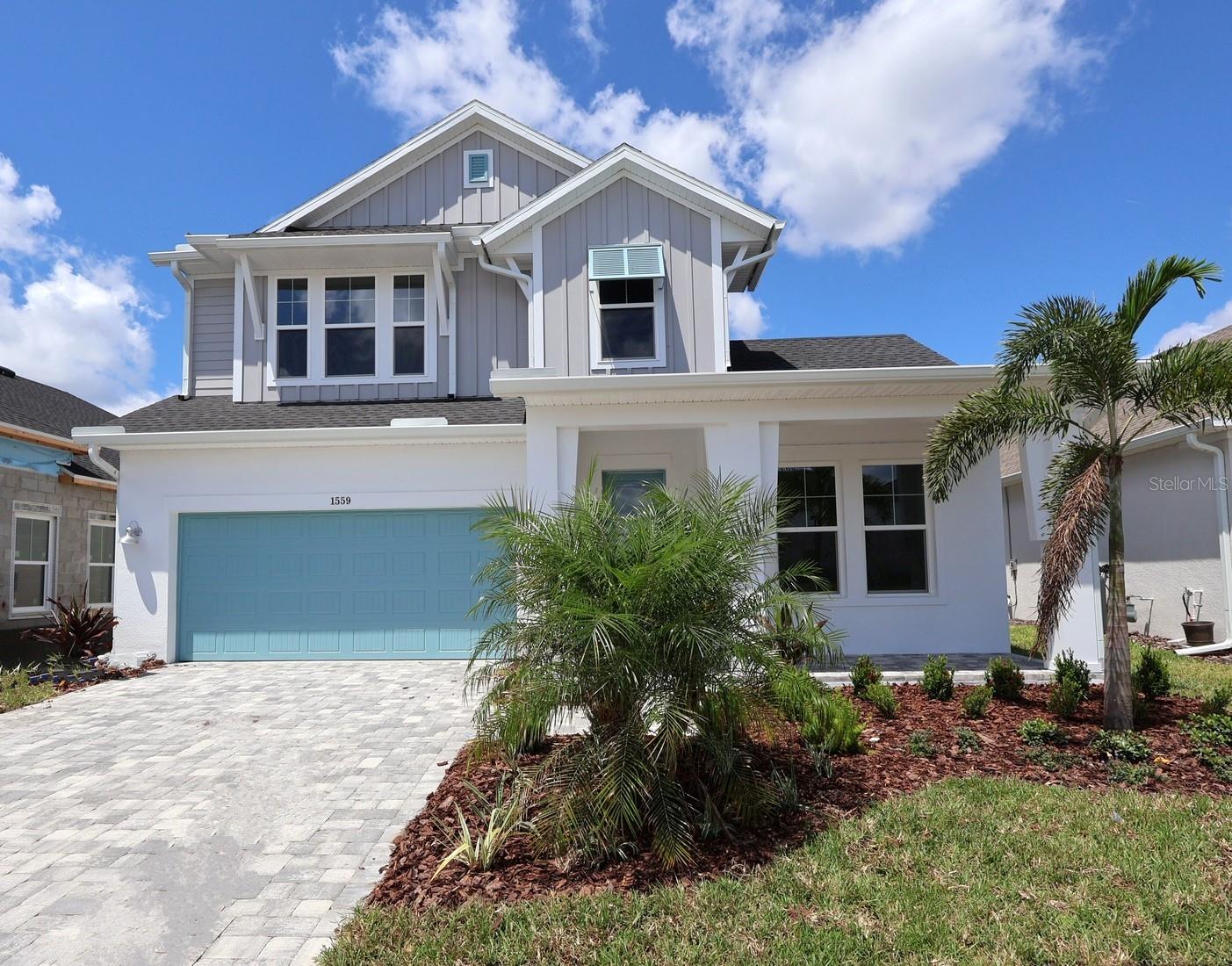 Under Construction. Welcome to The Flatwater by David Weekley Homes, where expert craftsmanship meets modern Florida charm in the heart of Emerald Landing at Waterside, Lakewood Ranch. Thoughtfully designed and richly appointed, this spacious, stylish home is built to elevate your every day.
Step inside and feel the difference—soaring vaulted ceilings in the family room fill the space with natural light, highlighting the home’s sleek, contemporary lines. The designer kitchen is a culinary dream, featuring a built-in cooktop, microwave and oven, designer vent hood, and premium KitchenAid appliances. A stunning 9-foot multi-sliding glass door invites you to blur the lines between indoor comfort and outdoor living. Stepping out of the sliding doors, you will have a private pool you can enjoy swimming and watching the sunsets over Spoon Bill Lake.
Whether you're entertaining or relaxing, the extended lanai and spa-inspired Owner’s Retreat with its luxe super shower upgrade offer the perfect escape. Need a dedicated workspace? The enclosed study is ideal for working from home in peace. Upstairs, a versatile retreat makes the perfect game room, media lounge, or creative space, while a guest suite and two additional bedrooms offer plenty of room for everyone.
This low-maintenance, energy-efficient home features natural gas, hurricane impact windows, and HOA-managed landscaping and irrigation—so you can spend less time on chores and more time enjoying the lifestyle you deserve.
Live like you're on vacation with resort-style amenities including a lakeside heated pool, shaded cabanas, pickleball courts, fire pit, dog park, clubhouse with a wraparound porch and kitchenette, plus miles of scenic trails. Take the water taxi to the local Waterside Place farmers market or explore the vibrant dining and shopping just minutes from your doorstep. Your future starts here. Contact the David Weekley Homes team at Lakewood Ranch to tour The Flatwater and make your dream home a reality in Sarasota, FL. **Purchase a select David Weekley Quick Move-in Home from September 1st – September 30th, 2025, qualified buyers may be eligible for a starting rate as low as 3.99% (4.271% APR) when the home purchase is financed with a conventional 7/6 adjustable-rate mortgage home loan from our preferred lender!