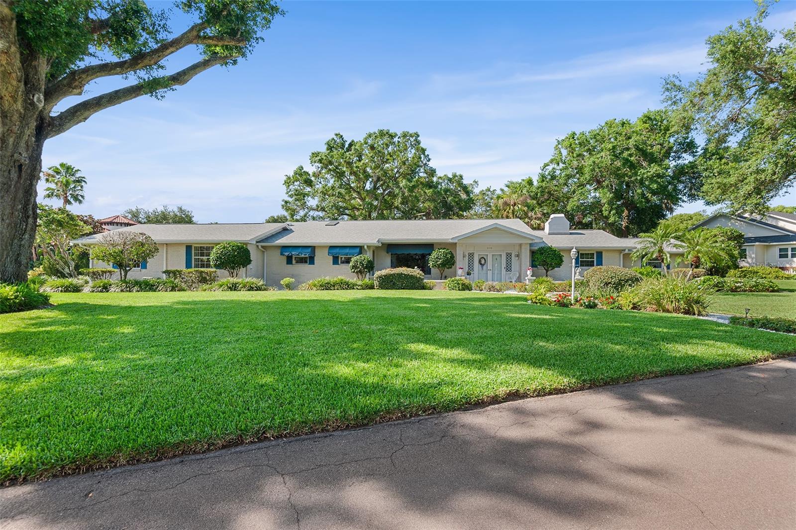 Just Steps from Lake Hollingsworth! Discover this exceptional 3,280 sq. ft. single-story pool home nestled in one of Lakeland’s most coveted neighborhoods. Currently configured as a 3-bedroom, 3-bath home, the flexible floor plan offers the potential to easily convert to up to 5 bedrooms—perfect for growing families or multi-generational living. The home comes furnished with newer, stainless-steel appliances, blending modern convenience with timeless charm. Surrounded by .52 acres of lush, mature landscaping, the private backyard oasis features a stunning resort-style pool—ideal for entertaining or relaxing in total tranquility. Designed with gatherings in mind, this home offers ample space to host family and friends both indoors and out. Enjoy the serenity of nature while being just moments from Lake Hollingsworth, premier golf courses, tennis courts, and upscale shopping. Select antique furnishings throughout the home are also available for purchase, adding a unique touch of elegance and character. A rare opportunity to live in the heart of Lakeland with luxury, comfort, and convenience all in one.