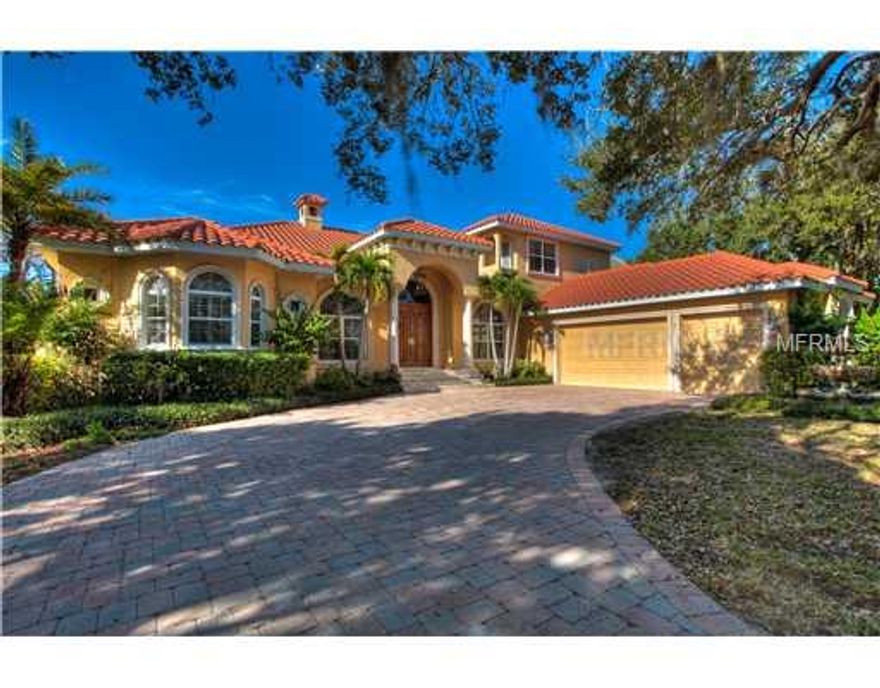 Enjoy breathtaking sunsets from your terrace. Looking for a newer home on open bay? Bring your boat! You have found your new dream home! Travertine and wood flooring throughout. Spacious master bedroom with gorgeous bay views. Luxurious master bath with Italian marble. Entertain your guests in your open gourmet kitchen with a wonderful view of the bay. Wine cellar with plenty of room for your collection. Open floor plan with over 5,000 square feet of living space including a bonus room. Spectacular family room windows open your indoor space to the outside waterfront lifestyle. Gas fireplace in your formal living room. Marvelous pool and spa area with views of the open waterways from every angle. Deep water boat dock can accommodate a 45' boat. Are you ready to live the Florida lifestyle?