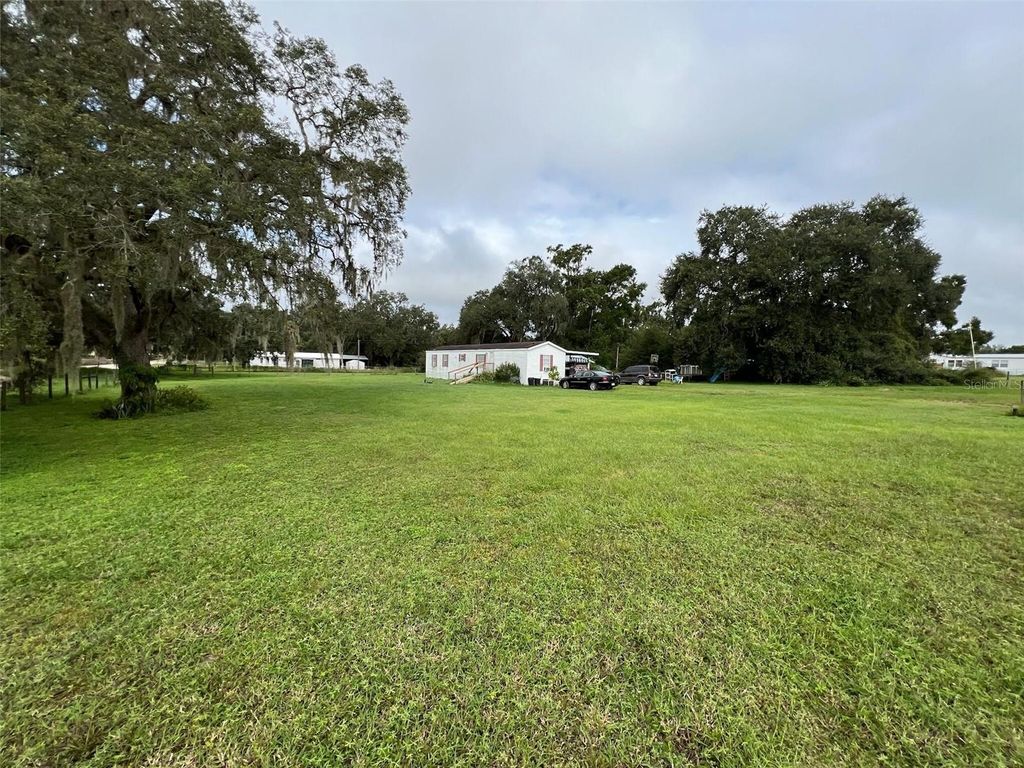 Photo of 37321 Phelps Road, Zephyrhills, FL 33541 (MLS # O6351360)