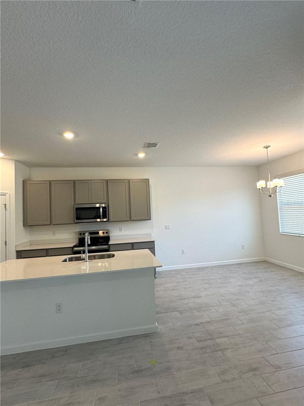 Photo of 788 Sunshower Drive, Lady Lake, FL 32159 (MLS # O6381199)