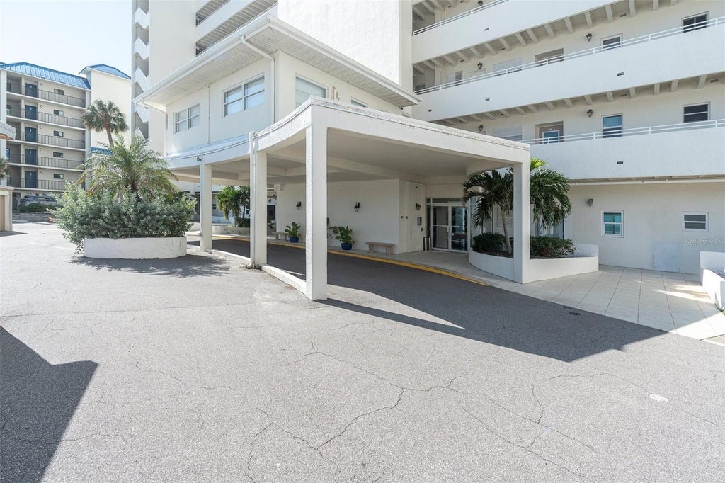 Photo of 7000 Beach Plaza #303, St Pete Beach, FL 33706 (MLS # TB8549506)