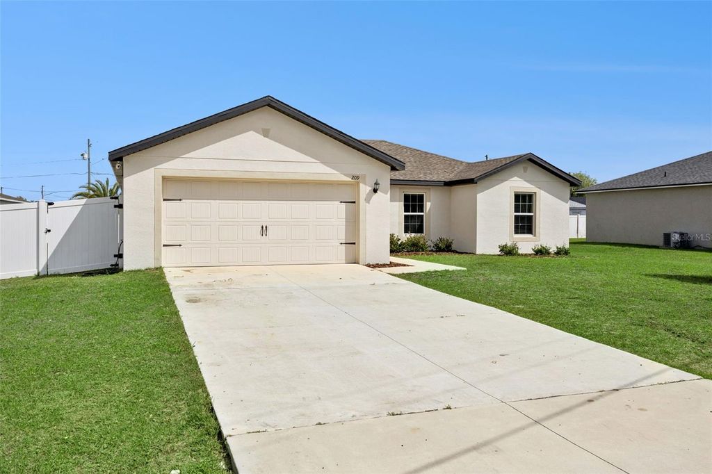 Photo of 209 Cimarron Drive, Kissimmee, FL 34759 (MLS # O6395162)