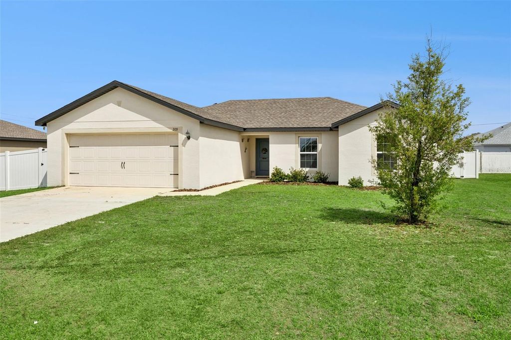 Photo of 209 Cimarron Drive, Kissimmee, FL 34759 (MLS # O6395162)