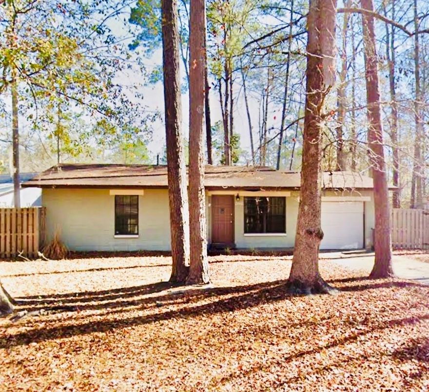 Welcome to 4229 NW 29th Terrace, a 3-bedroom, 2-bathroom home with a garage located on a spacious 0.27-acre lot in a quiet, established Gainesville neighborhood with mature trees.
The home features tile flooring throughout, a bright and functional layout, updated bathrooms, and a refreshed kitchen. A separate laundry / mud room provides additional convenience and storage.
The large, privacy fenced backyard offers plenty of outdoor space and is highlighted by a pergola, creating a great setting for relaxing or entertaining.
Conveniently located just minutes from the University of Florida, Shands Hospital, downtown Gainesville, and nearby shopping and dining.
